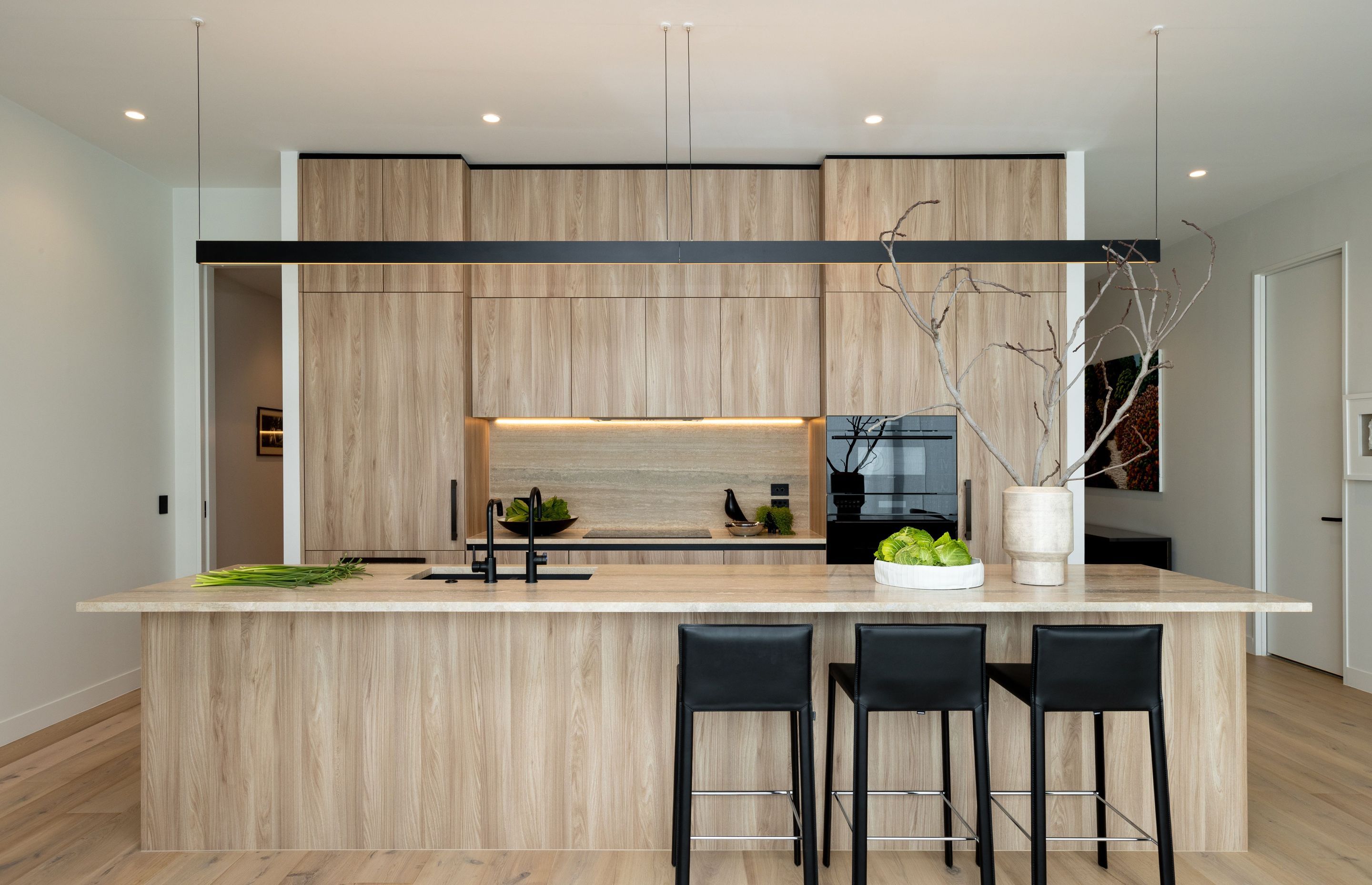 Custom kitchens were created for the penthouse levels using products from Arclinea's Convivium range.