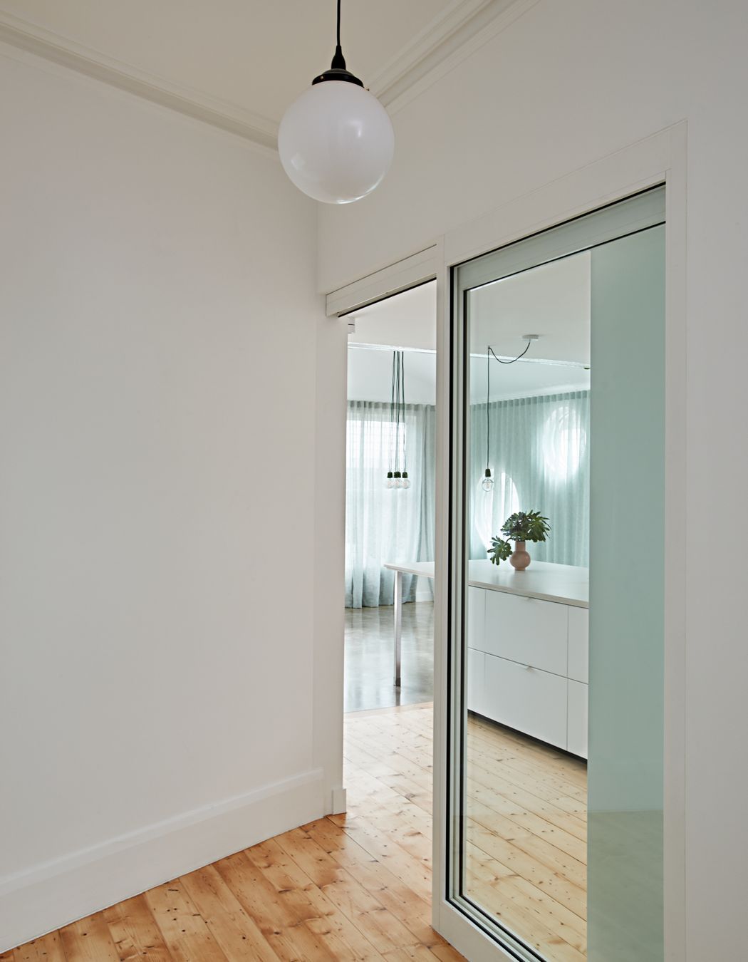 An airy extension to this 1980s California Bungalow-style home allows it to accomodate the client as well as his daughter and granddaughter | GreenHouse Northcote by Ansari Architects | Photography by Michelle Williams