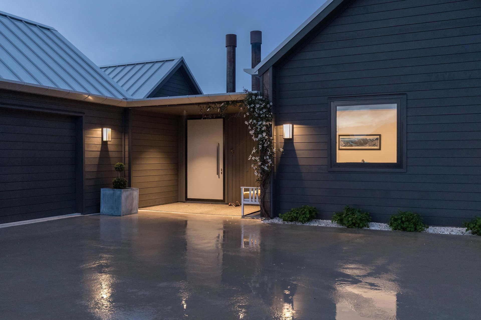 Flowering vines are the perfect complement to the entrance of this Wakatipu Basin home