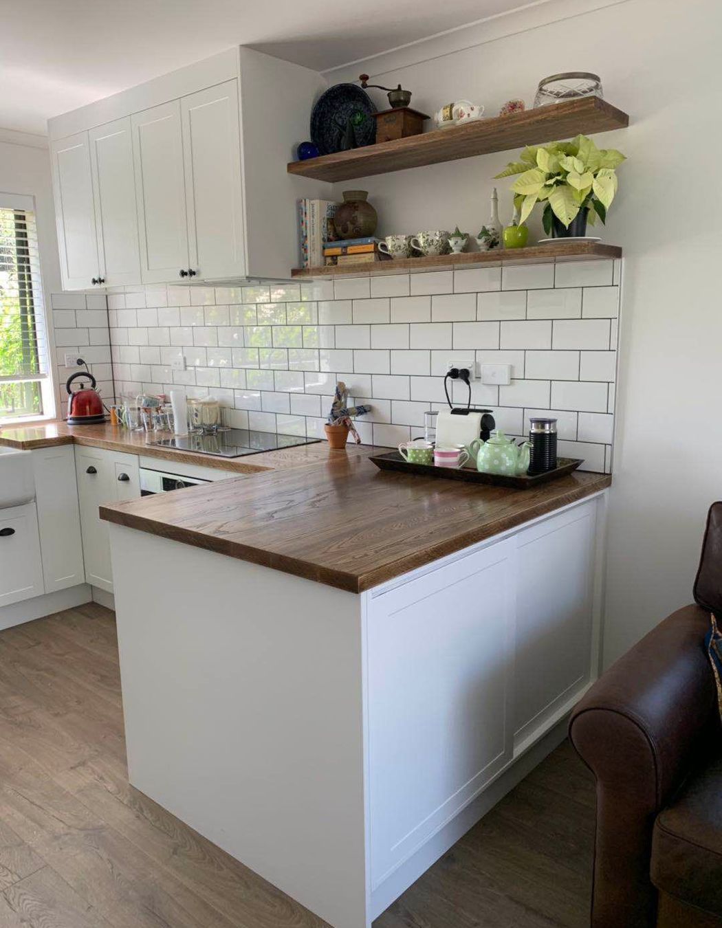 Kitchen renovation in South Auckland: Floating open shelves were added  to increase storage and add a design element to the kitchen.