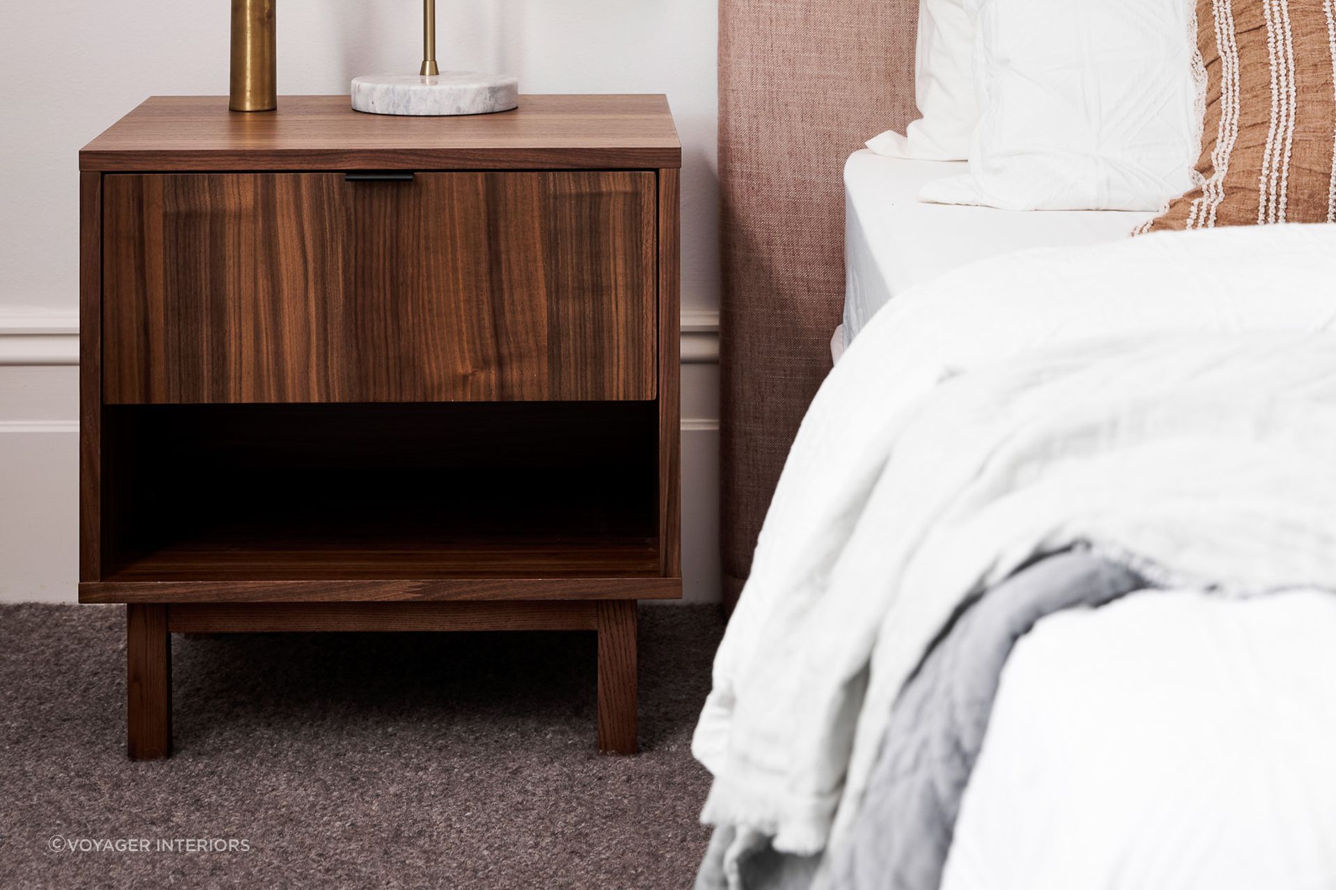A compact bedside table not only saves on space, but also provides adequate storage and a single or multiple drawers. Featured product: Dream Bedside Unit.