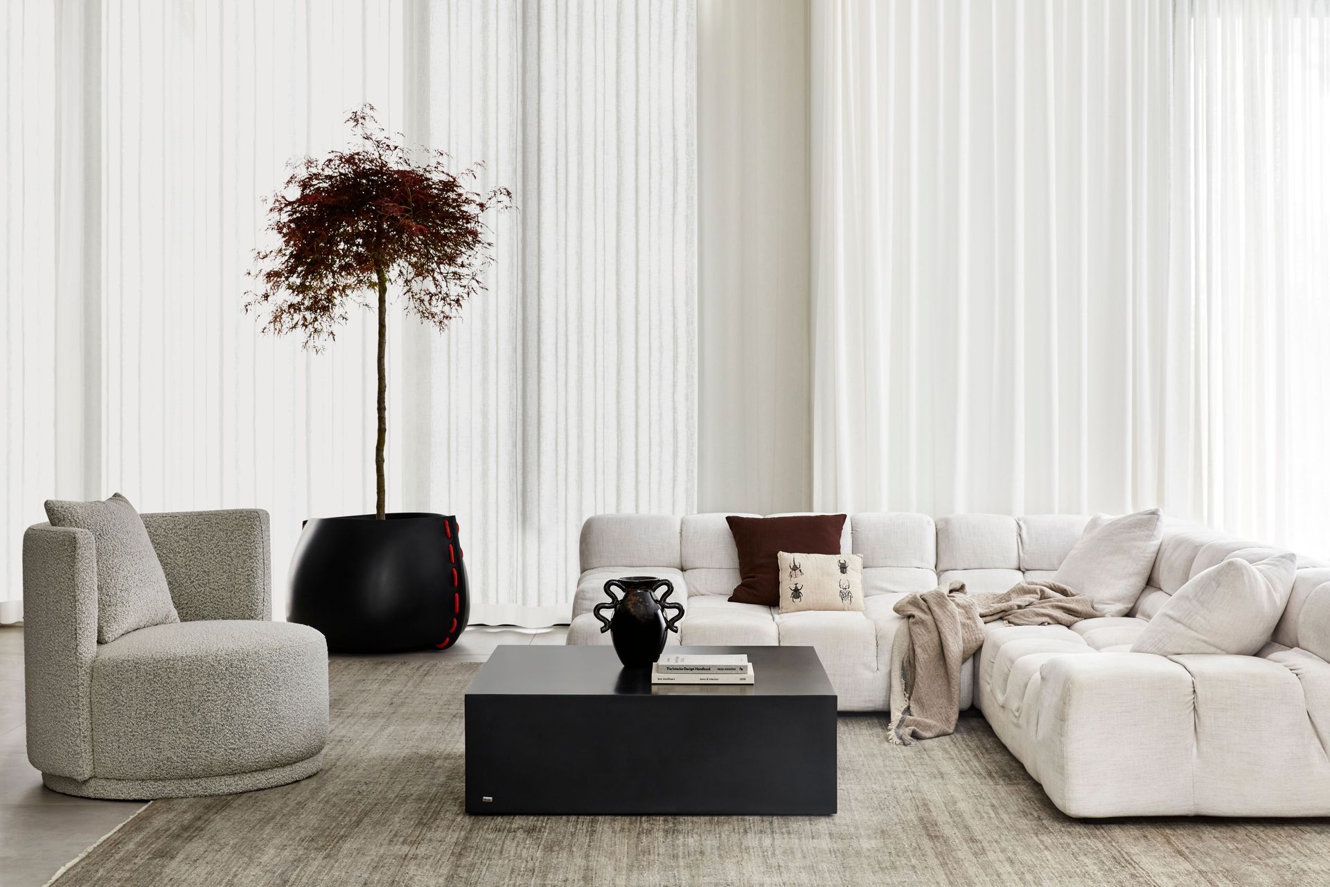 Bold yet minimalist, a concrete coffee table commands attention.