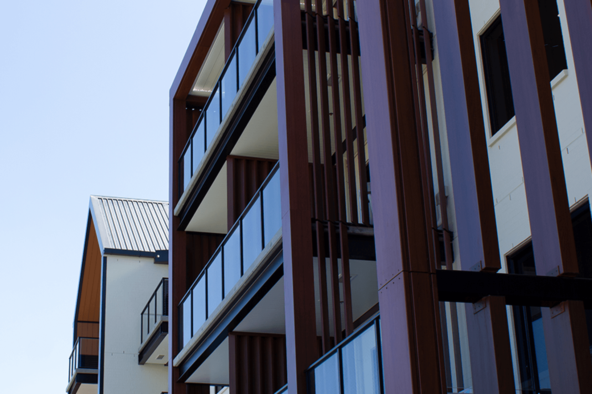 A matt-black finish with square profiles was specified to create a seamless aesthetic with the other architectural features.