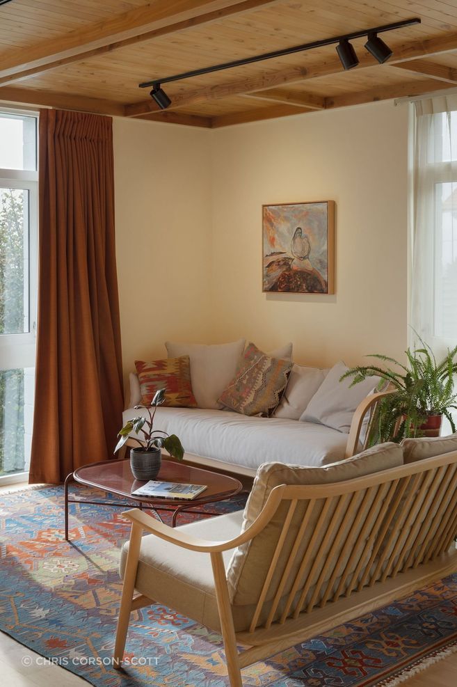 Interior Design and Architecture by Chris Corson-Scott and Pac Studio – Marino Sofa by Dylan Freeth and Nest Sofa (now out of production) for Ercol and with artwork by Star Gossage. Secant Coffee Table by Sara Wright Polmar for Warm Nordic