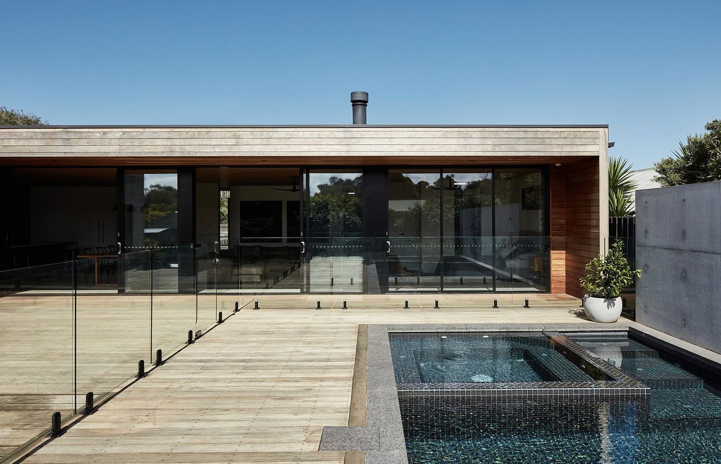 Concrete and Timber House by Planned Living Architects | Photography by Chris McConville