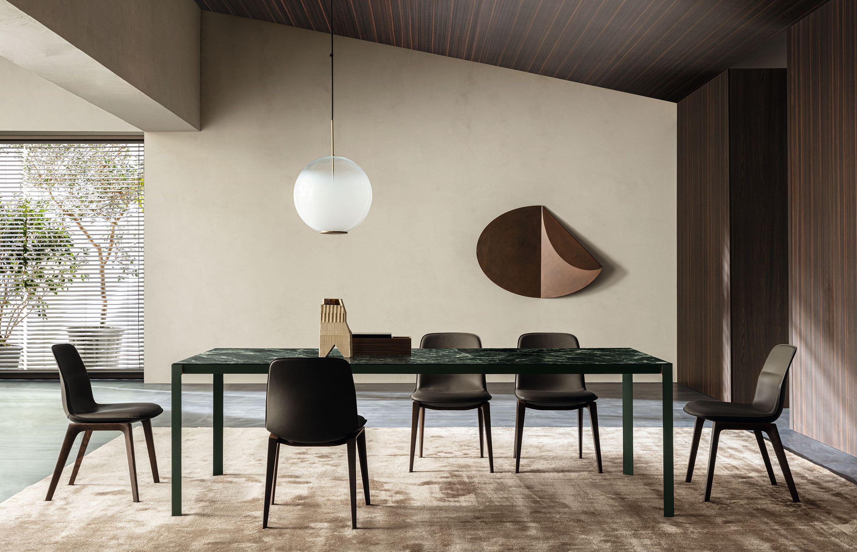 Part of a collection of square and rectangular tables designed by Michael Anastassiades, the Half A Square table is minimalist in design but rich in the combination of materials.