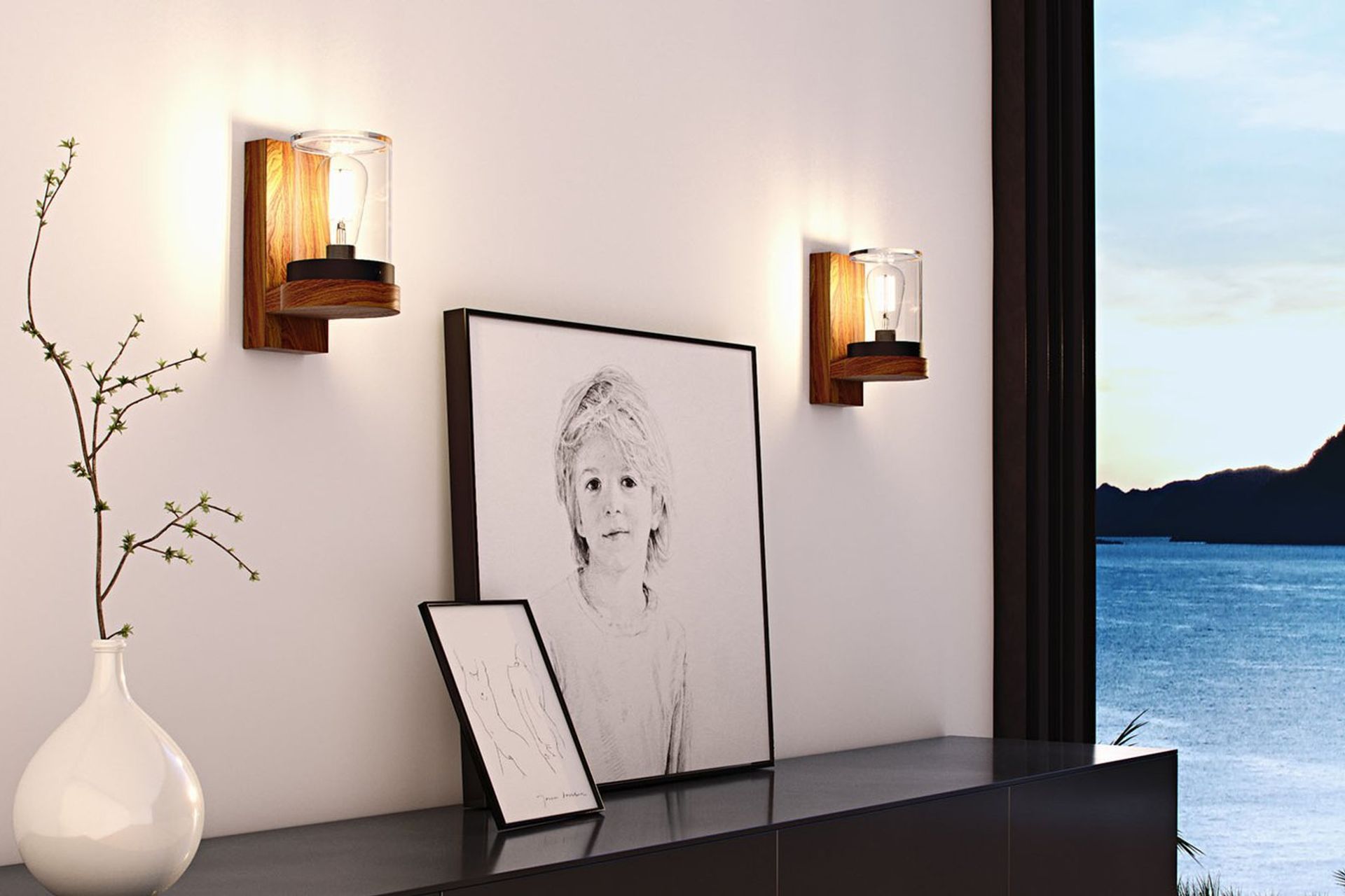 Your side walls are a great spot for lights like the Cloche Wall Light by Royal Botania