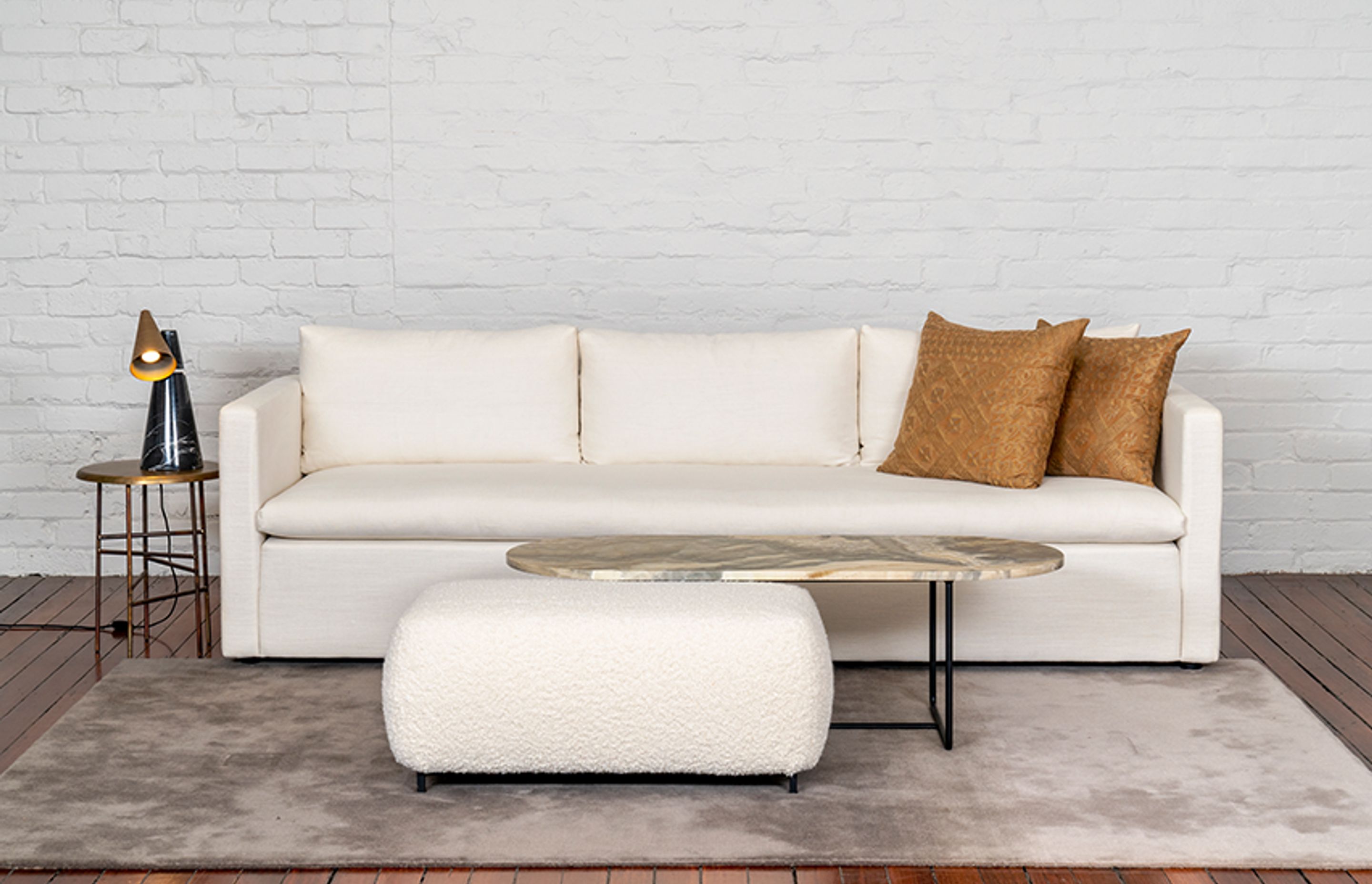 Designed as much for lounging as it is sitting, Hugo features a single feather fibre wrap seat for total comfort, matched with three feather fibre wrap back cushions.