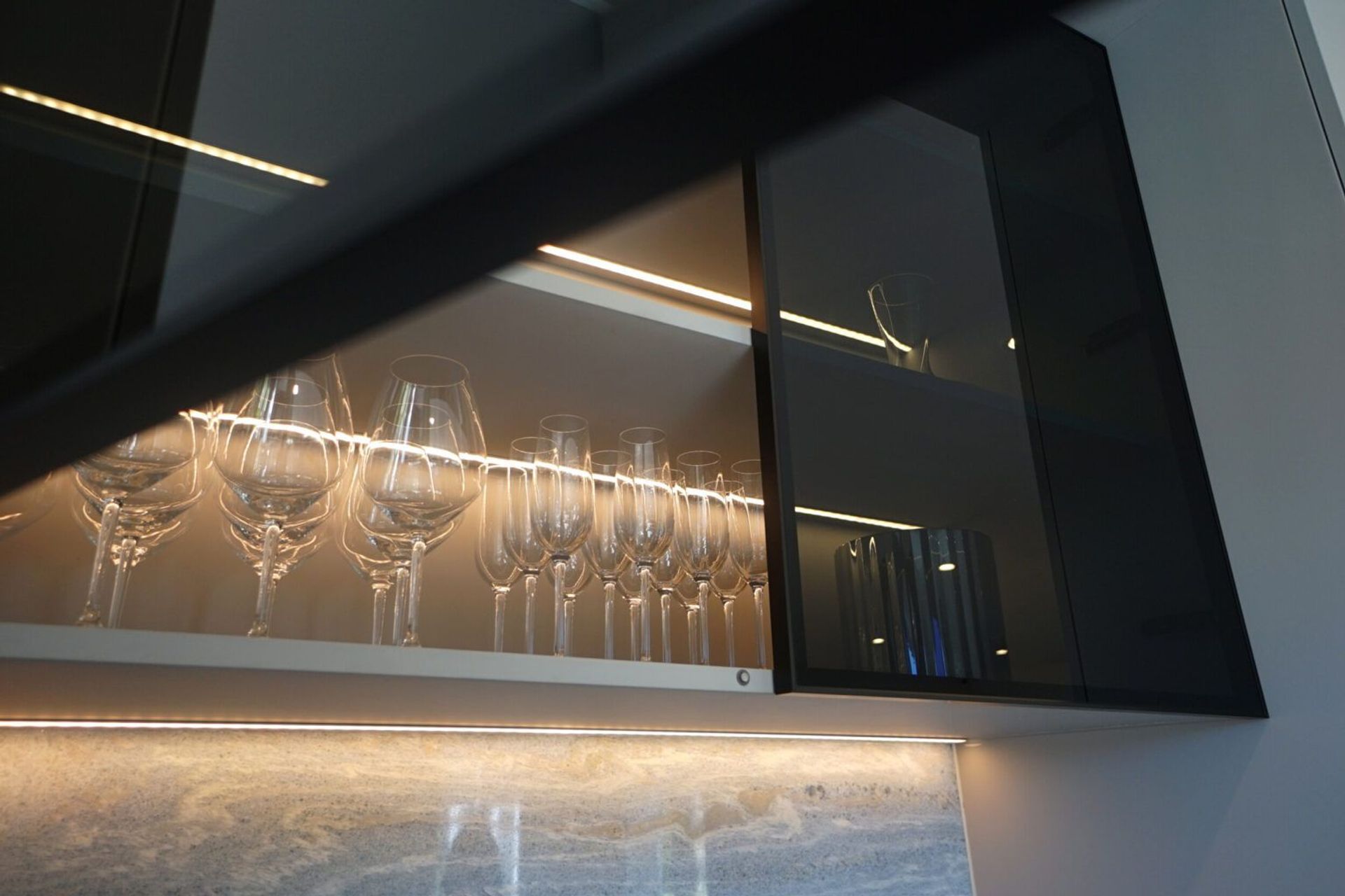 A closer look at the accent lighting and task lighting in the drinks/Coffee corner.