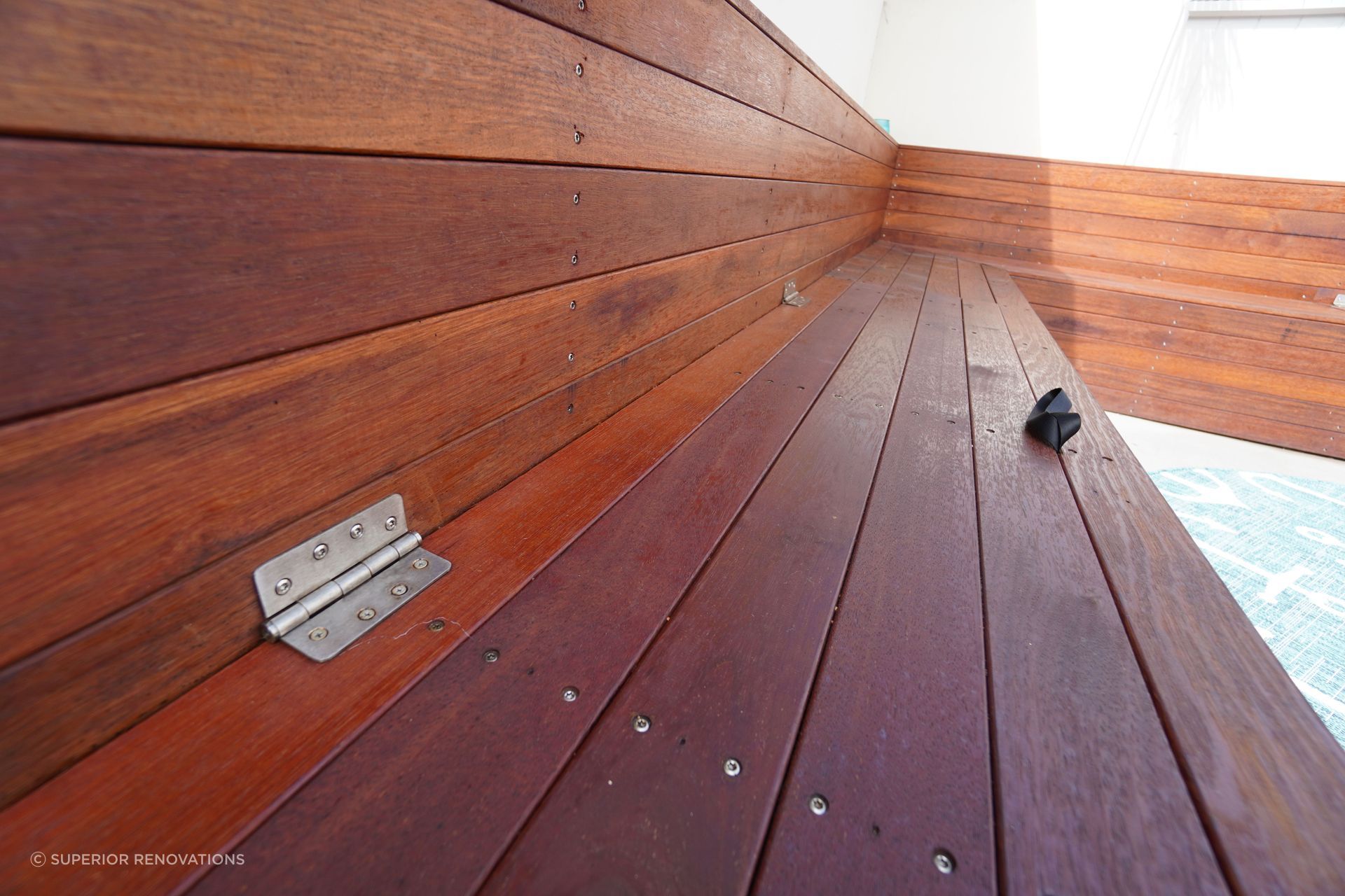 As seen in the picture, the benches have storage within them to store all outdoor accessories.
