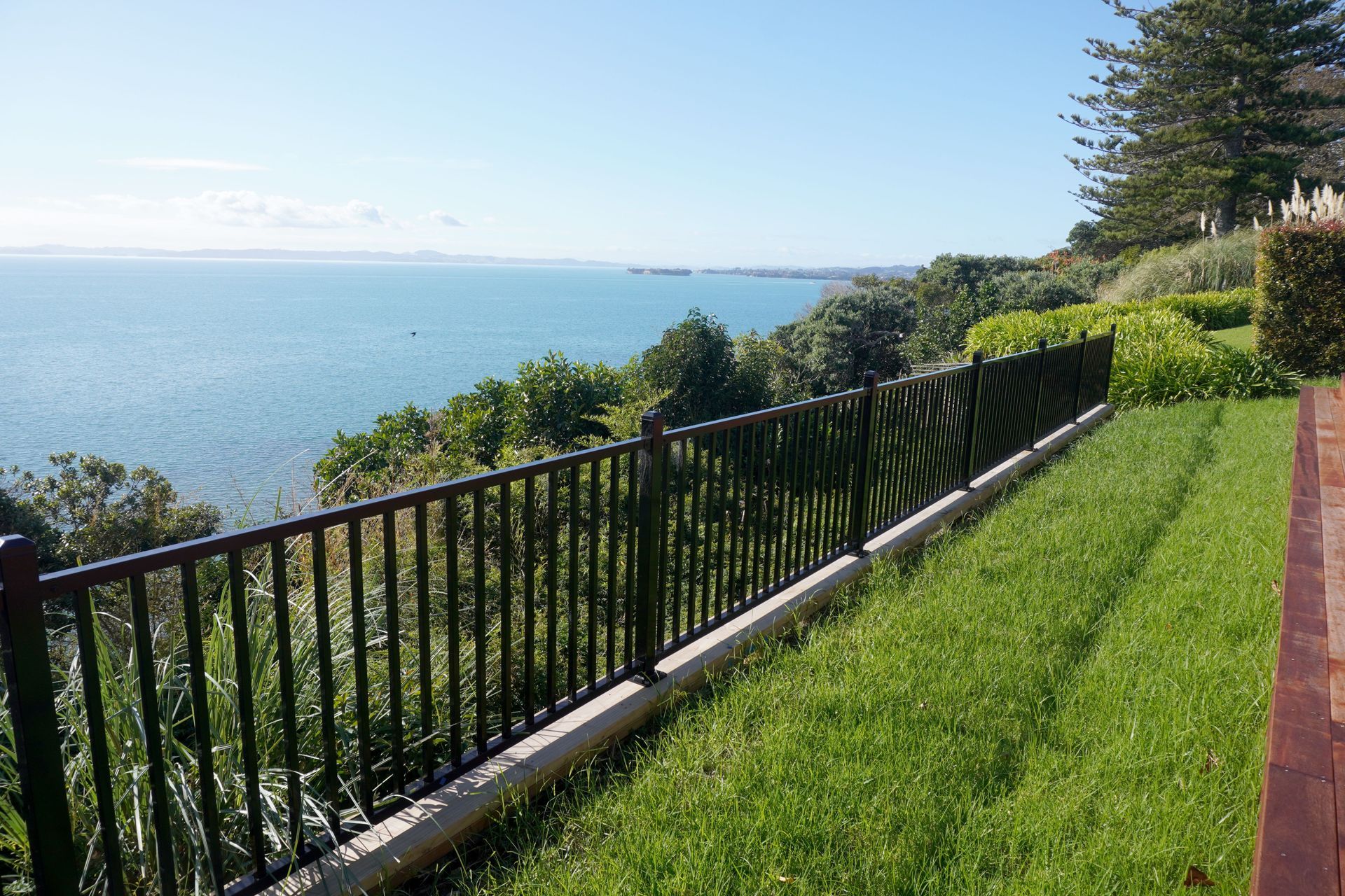 Alumininium Fencing in Mellons Bay which fences off the property from the cliff below.