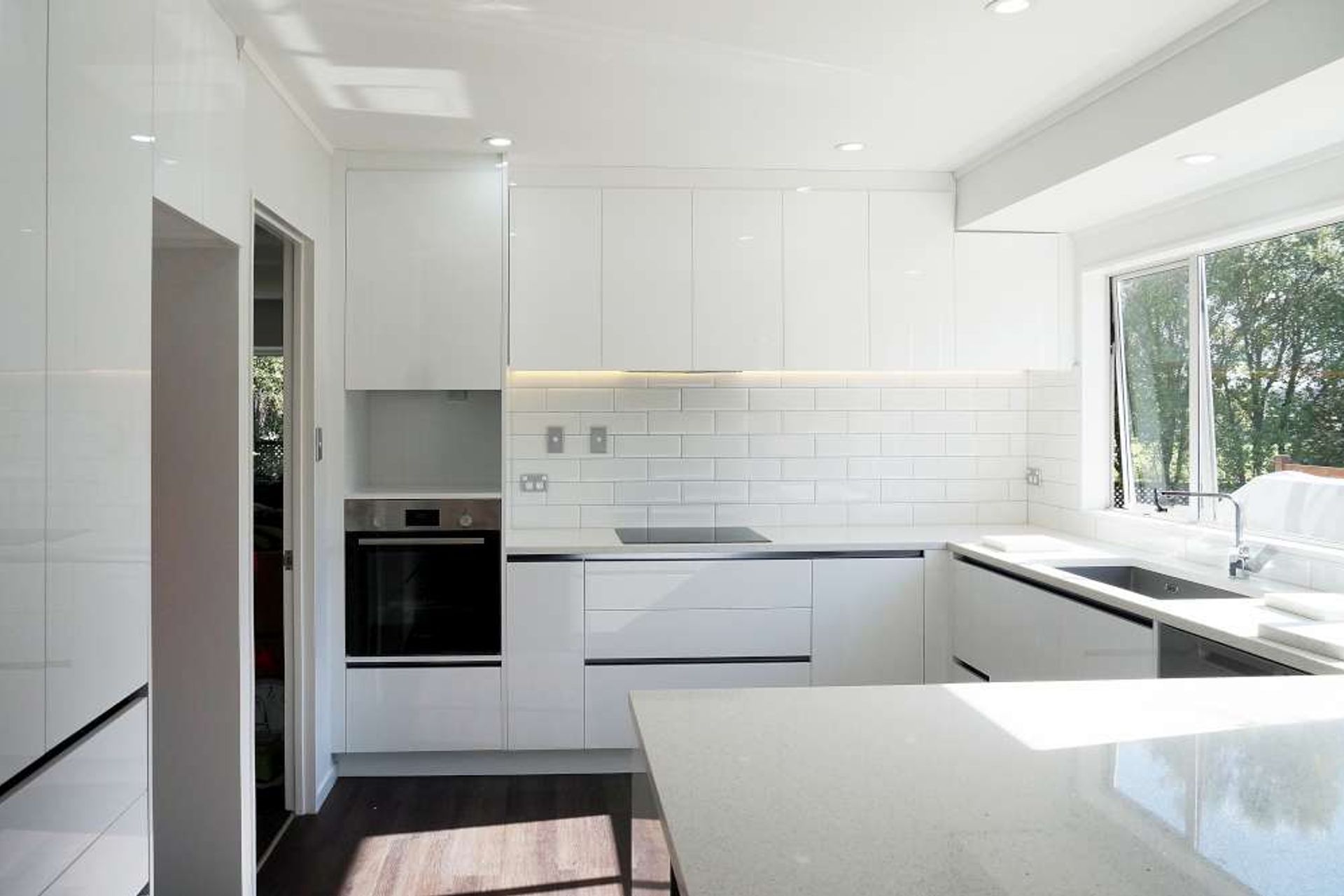 Kitchen renovation in West Harbour (see full case study by clicking on the picture)- Acrylic gloss finish cabinets custom built for low maintenance 