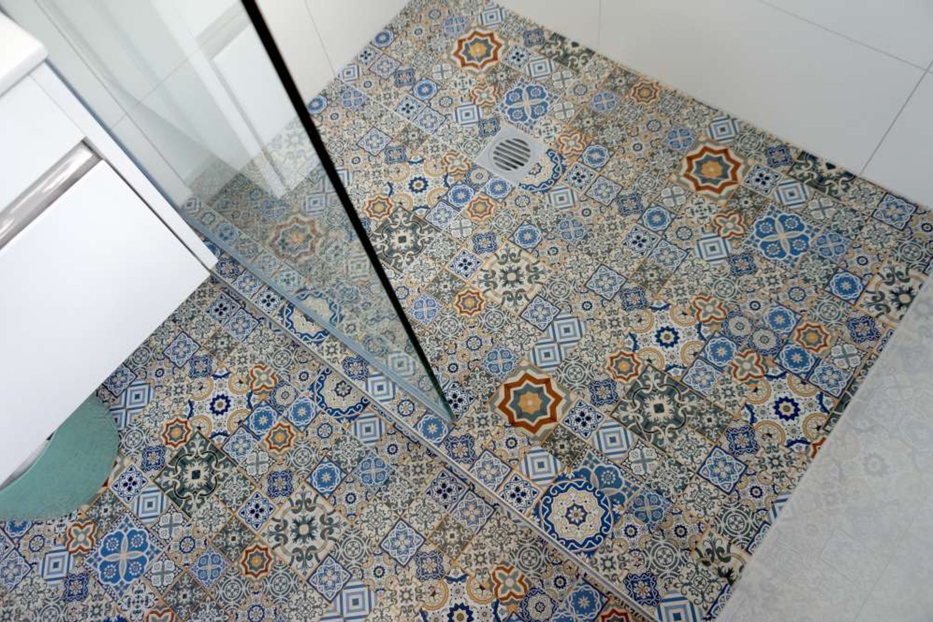 This bathroom in Hillsborough was fully renovated with Mosaic tiles used for the floors.
