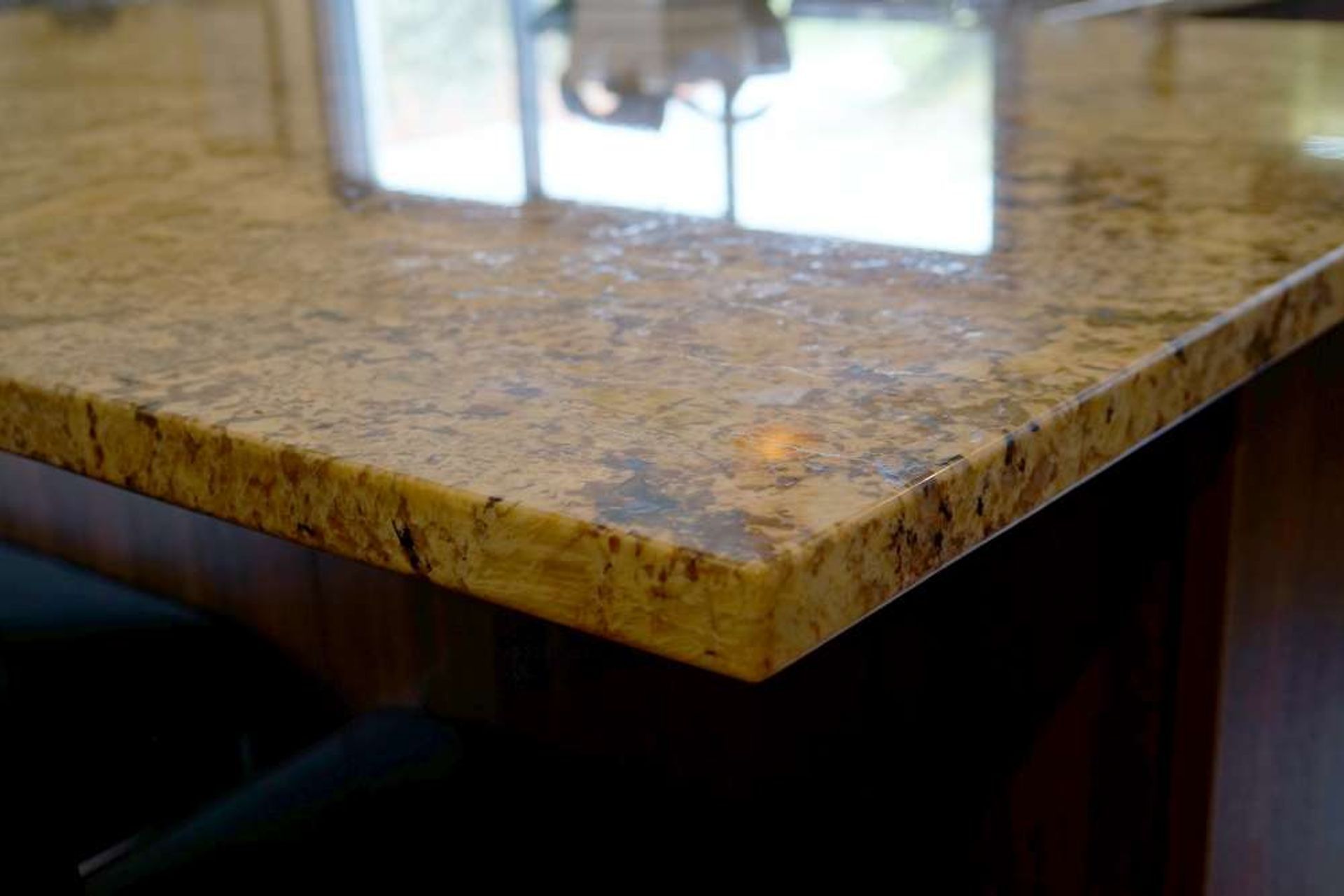 Kitchen renovation in Stanmore Bay: Engineered stone used to look like pattered granite. The pattern chosen by our client was Autumn Leaf. 