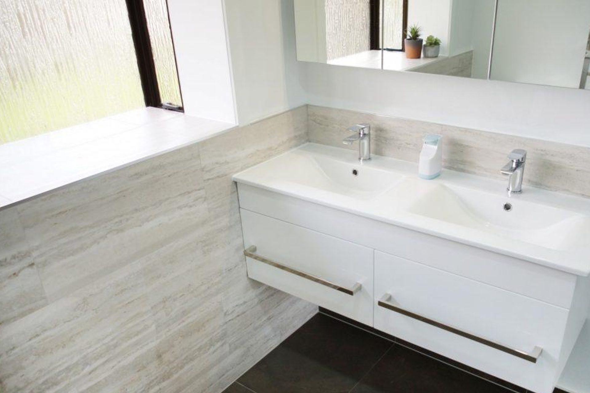 Wall mounted sink in Papatoetoe bathroom renovation