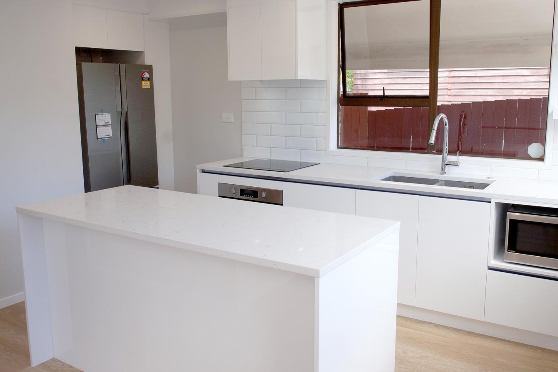 Another example of plain slabs used for cabinets – Modern kitchen in Avondale