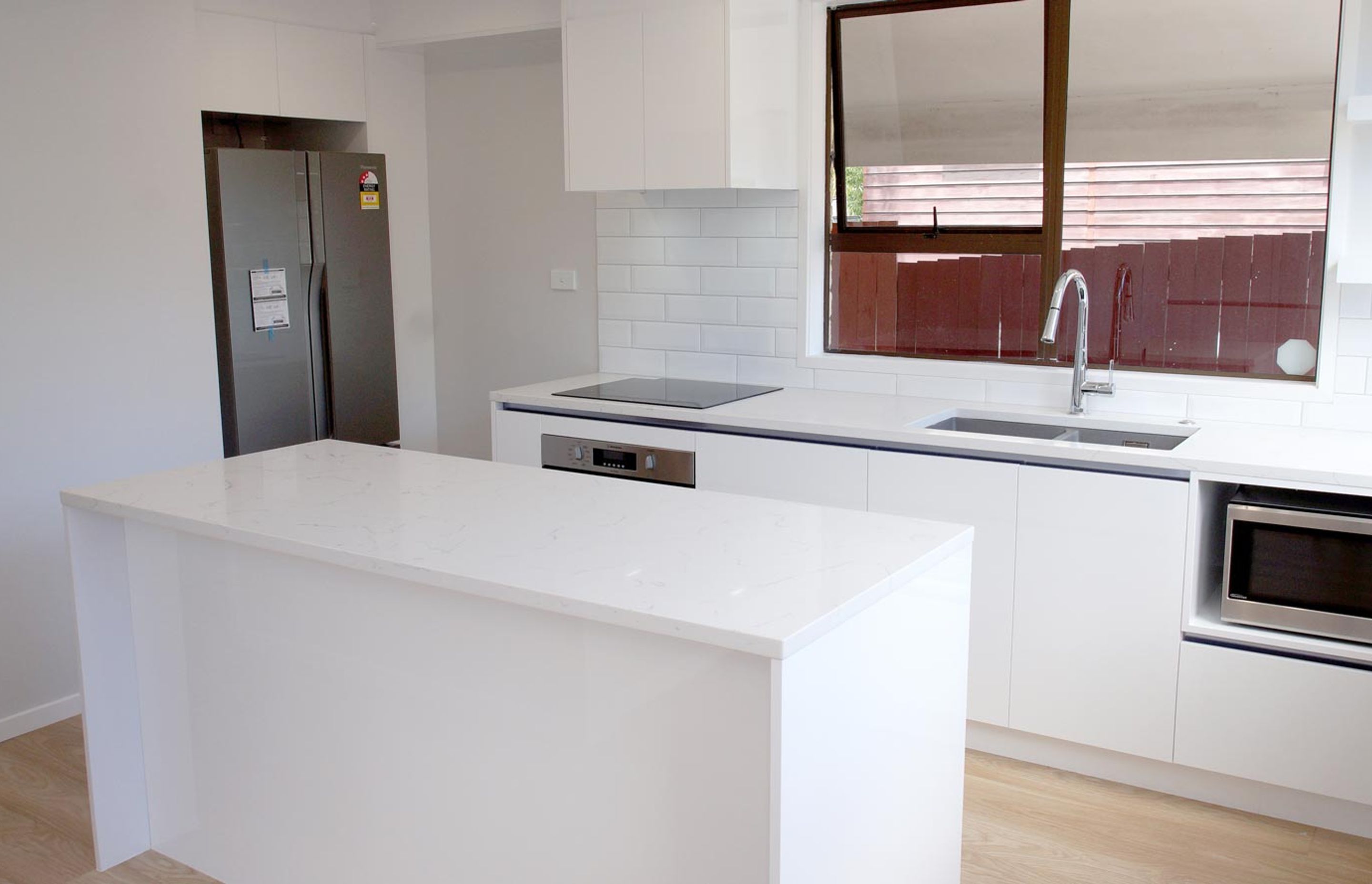 Another example of plain slabs used for cabinets – Modern kitchen in Avondale