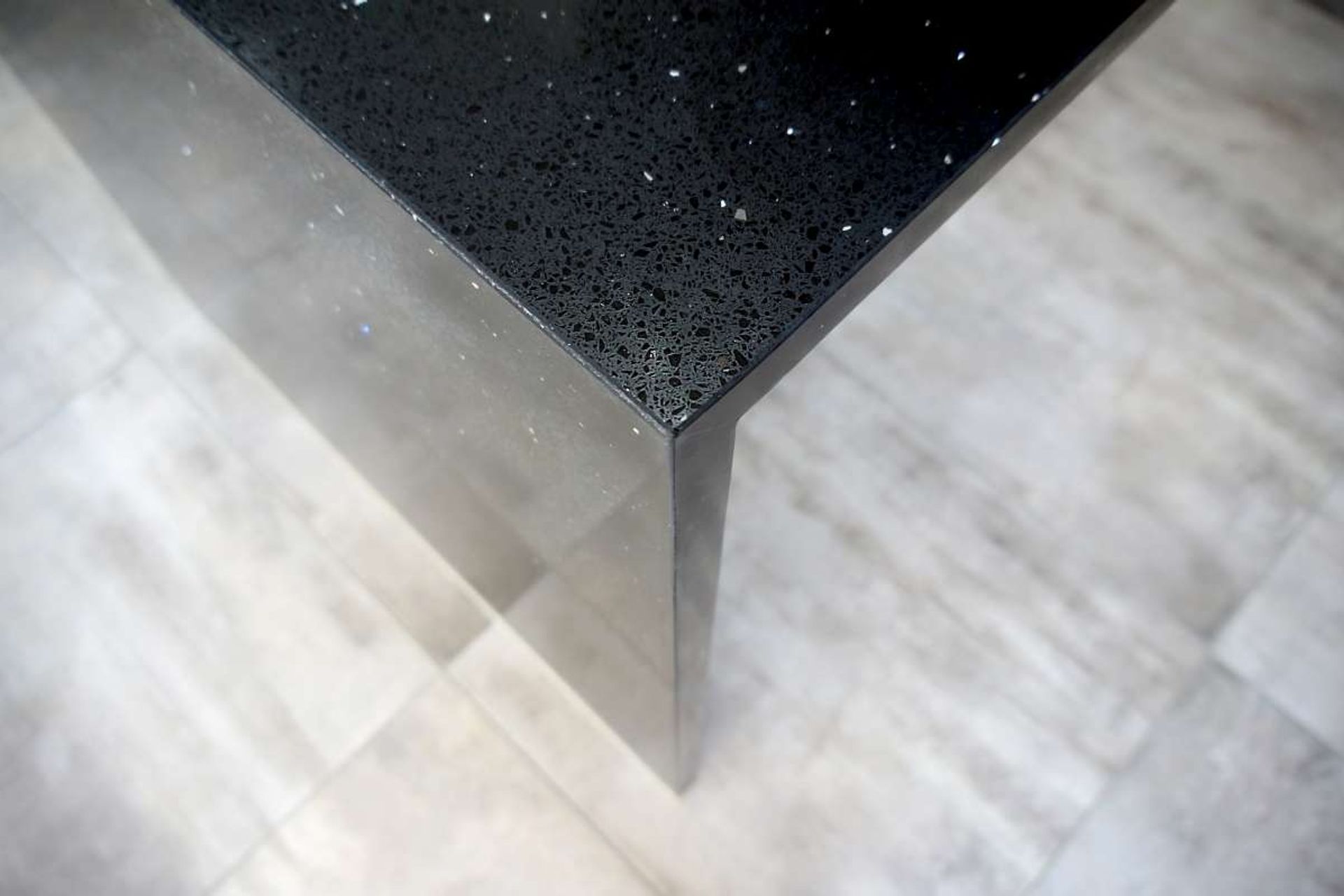 Black Stone engineered countertop with infused sparkles — Lynette and Henry’s kitchen renovation in Bucklands Beach.

