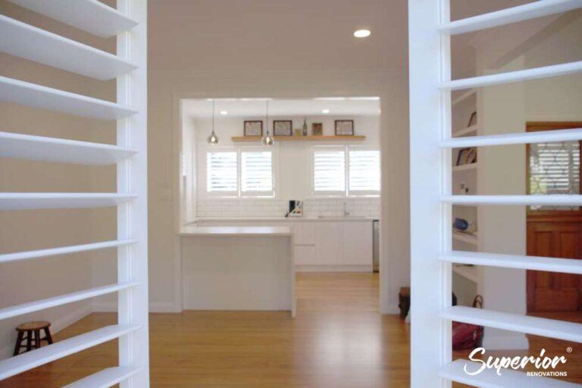 A clean modern look with a beautiful contrast of white with the classic timber