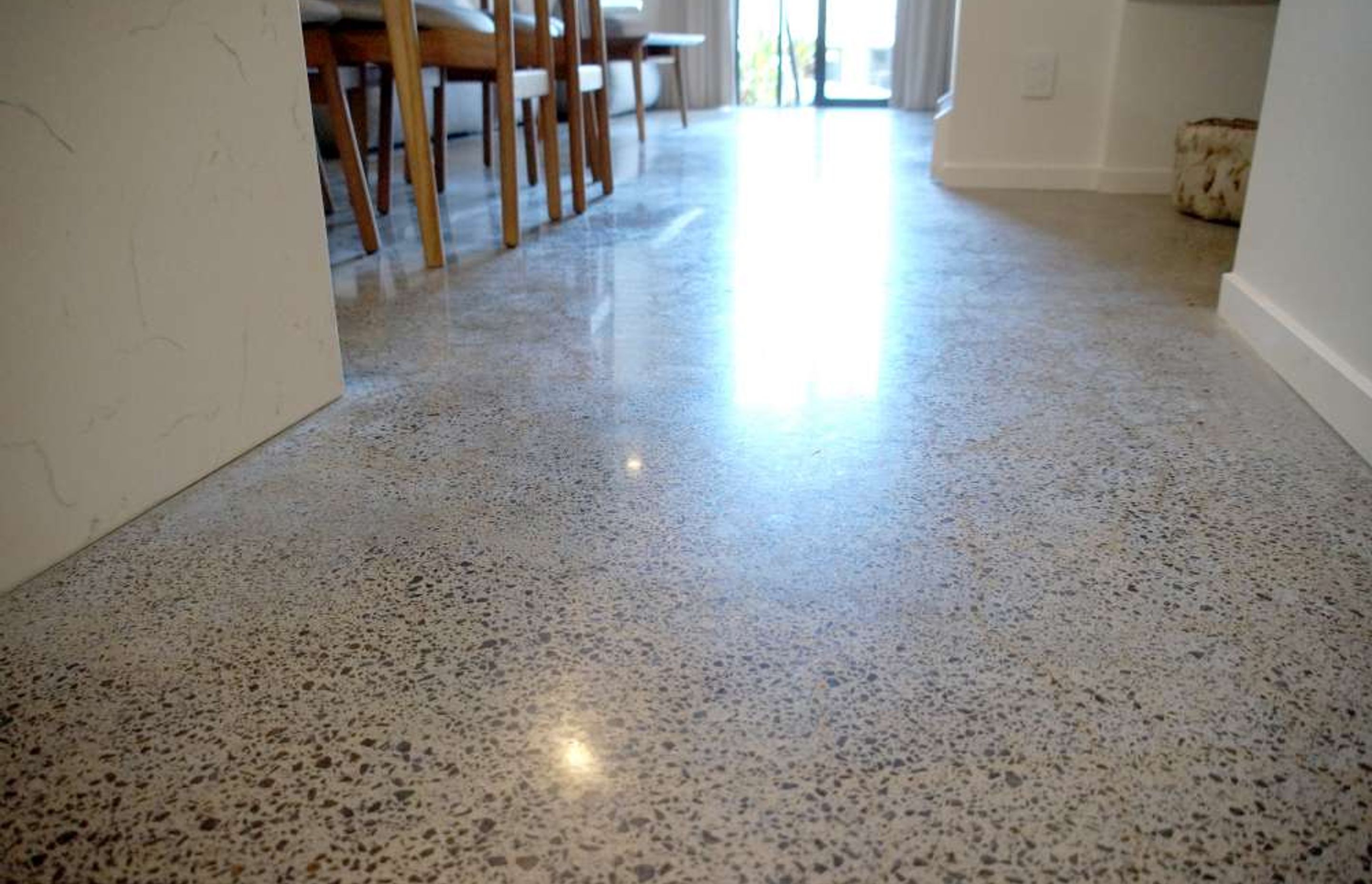 Poured concrete floor was chosen for this kitchen in Parnell
