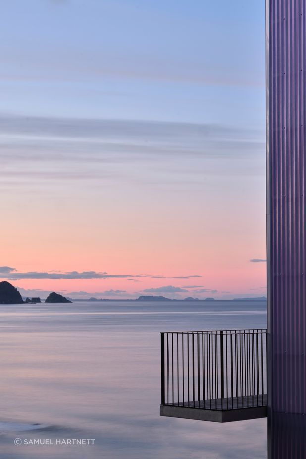 The build was oriented to the wide views. The balcony from the living room extends past the edge of the building to create a hidden corner. “You can’t see people, people can’t see you from inside. It’s a really cute moment,” says Dominic.