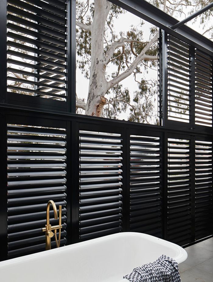 All about the tree: this renovation to an old general store in South Melbourne respects the existing tree and the history of the building. Yes, that is an external bathtub that you are looking at on the upper storey! This was a unique idea of the clients who dreamed of a relaxing bath while staring up at the canopy and stars.