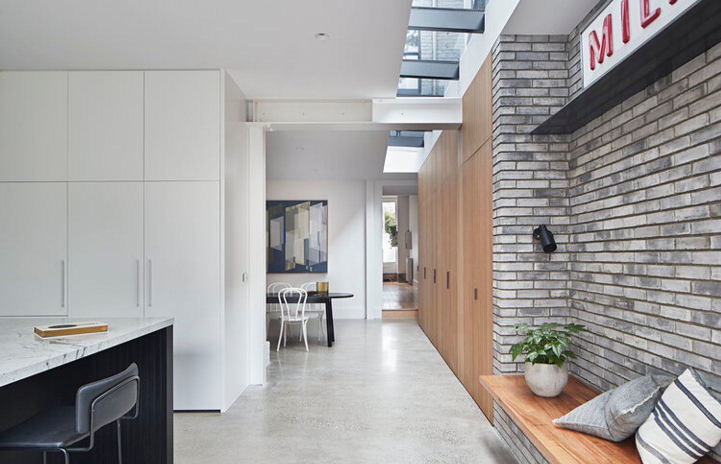 Terrace houses often need skylights to bring light into their deep and narrow floorplans, as seen in South Melbourne Terrace.