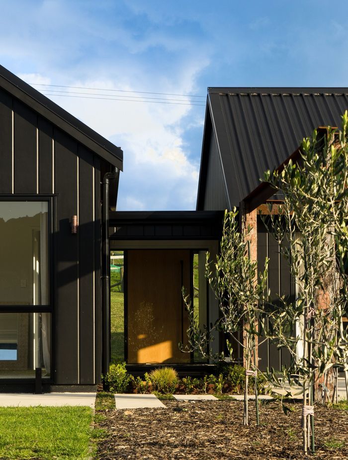 Floor to ceiling windows allow all-day sun into the Otaika Valley home.