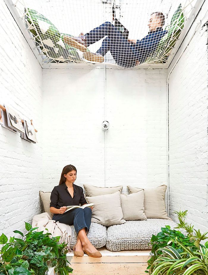 Converted elevator shaft lounge area in the office of Elizabeth Roberts Architects