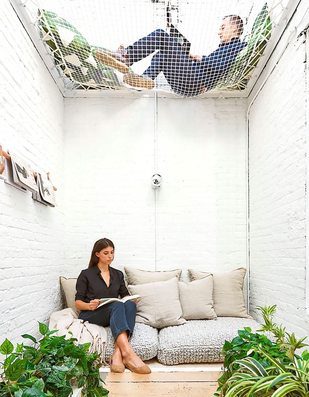Converted elevator shaft lounge area in the office of Elizabeth Roberts Architects