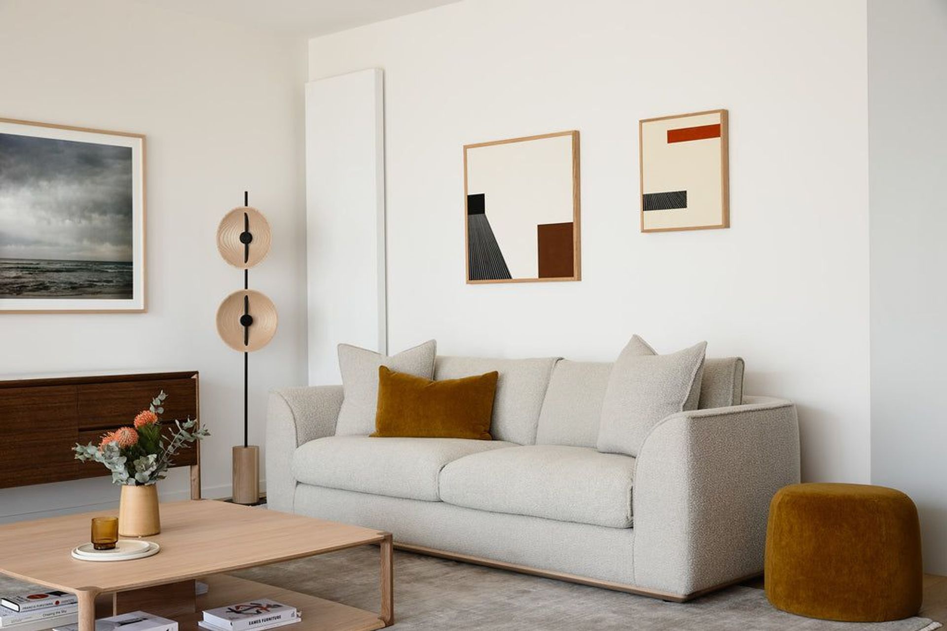 The Erskine Sofa by Kett featured in the Elwood home project. Photography: Derek Swalwell, Artwork: Boom Gallery featuring Kasper Raglus &amp; Anita Beaney, Lighting: Rakumba &amp; Ceramic: Ghost Wares.
