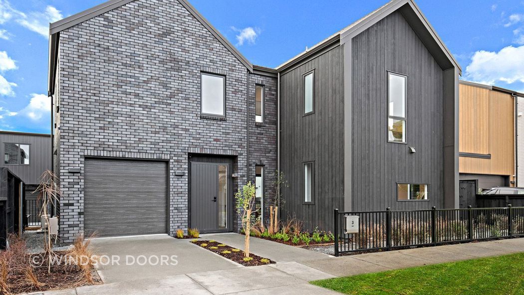 Flat Woodgrain sectional door in Colorsteel Grey Friars
