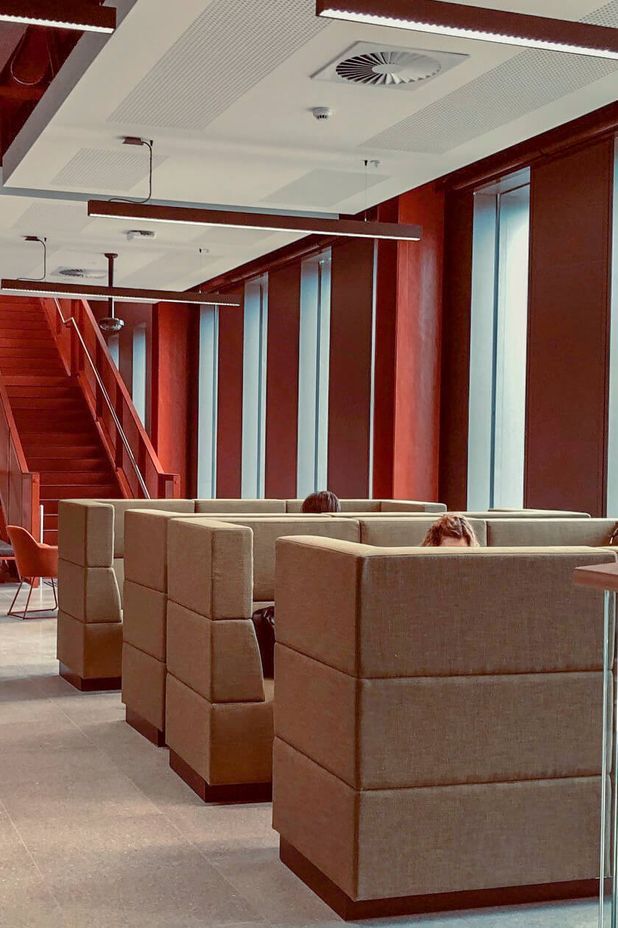 Custom high back modular lounges in collaborative hubs