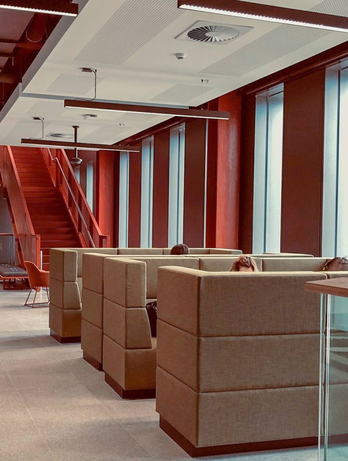 Custom high back modular lounges in collaborative hubs
