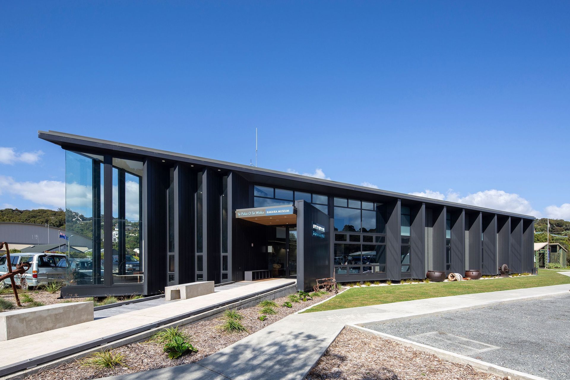 The boardwalk from the ferry leads visitors along the waterfront, and like a jetty, a path leads them straight into the museum.