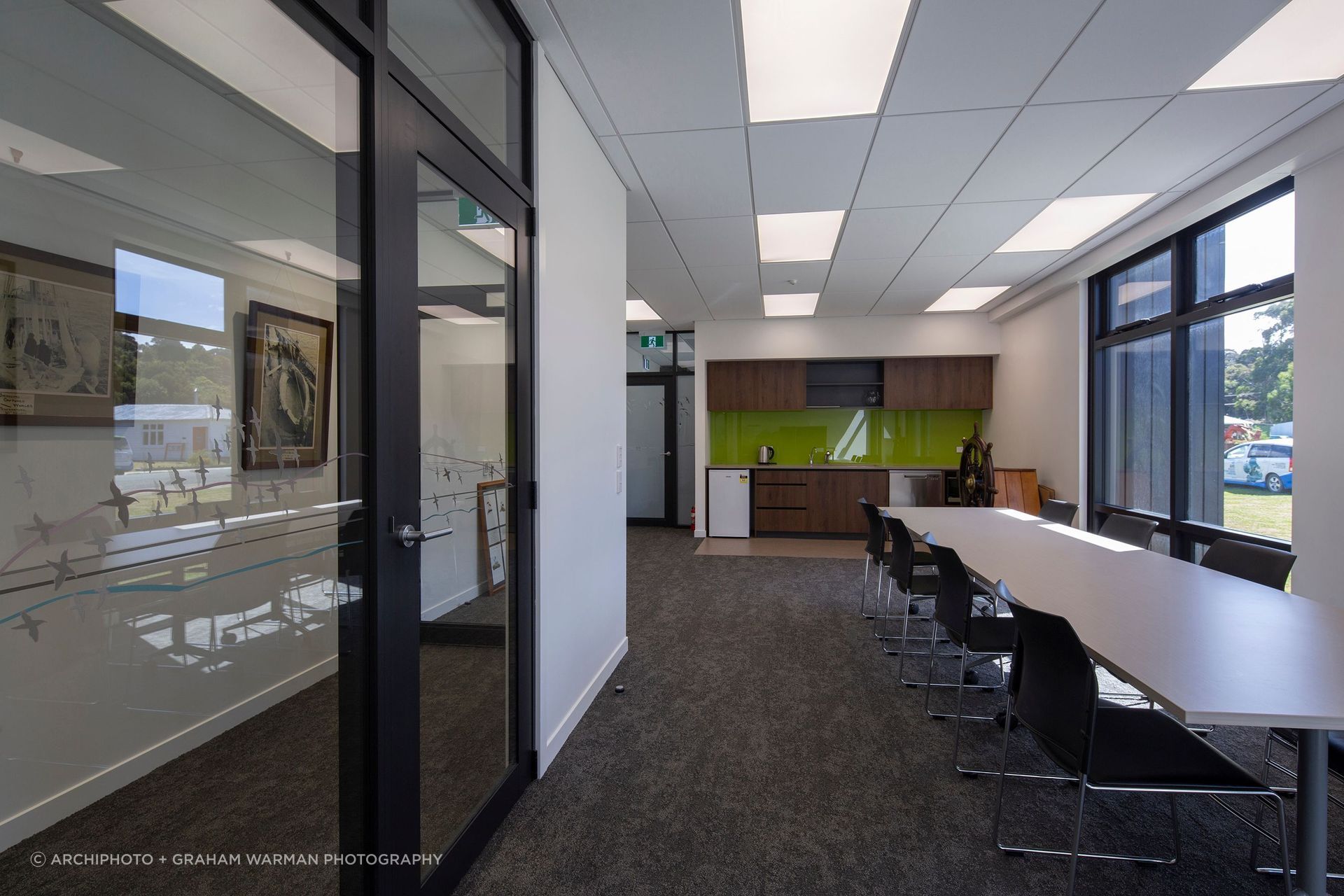 The cafeteria space does double duty as a space for public meetings and social gatherings.