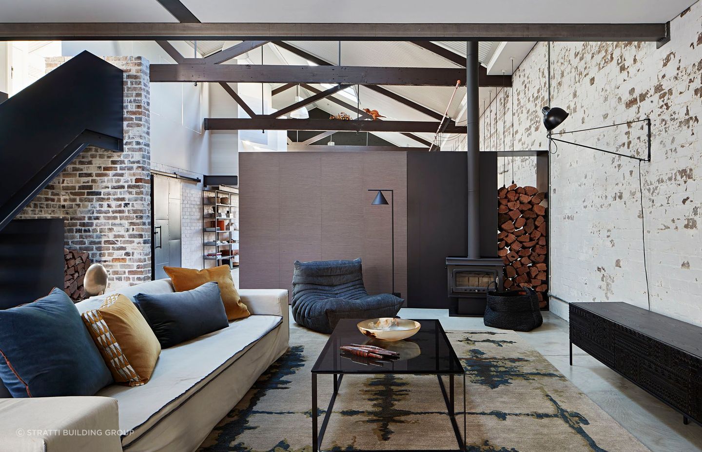 Exposed brick walls just one of many great features in this unique home converted from an old furniture factory