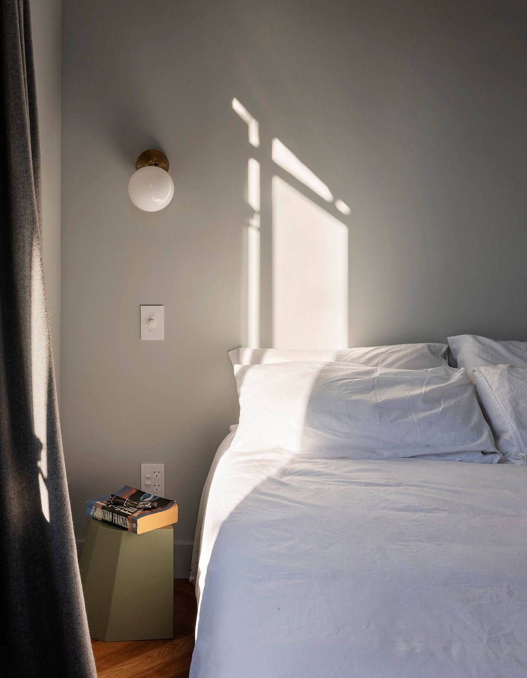 A tranquil colour palette was chosen for the bedroom.