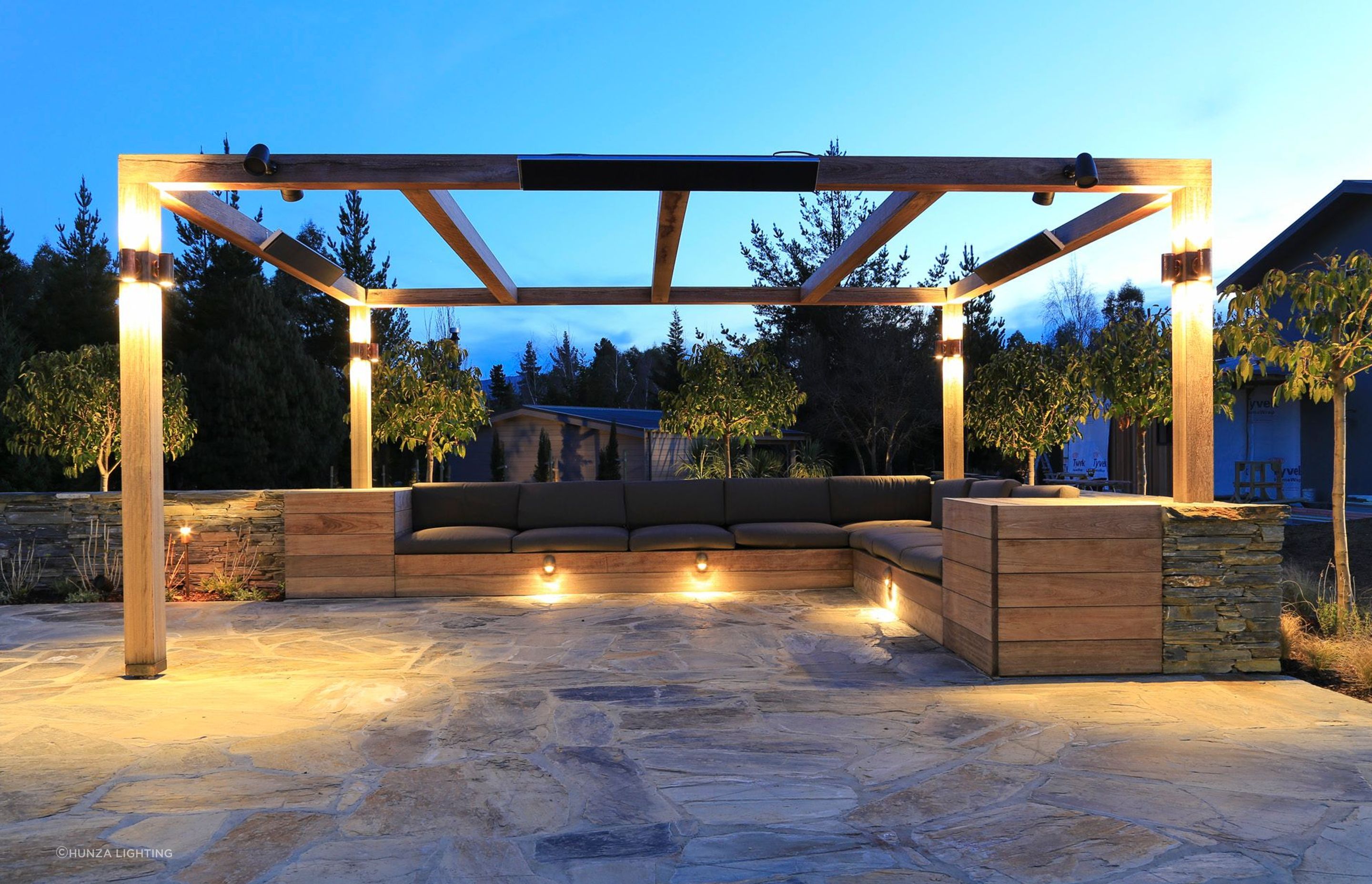 By keeping the lighting low and to the periphery, Lighting Revolution have created a functional and visually stunning outdoor space.