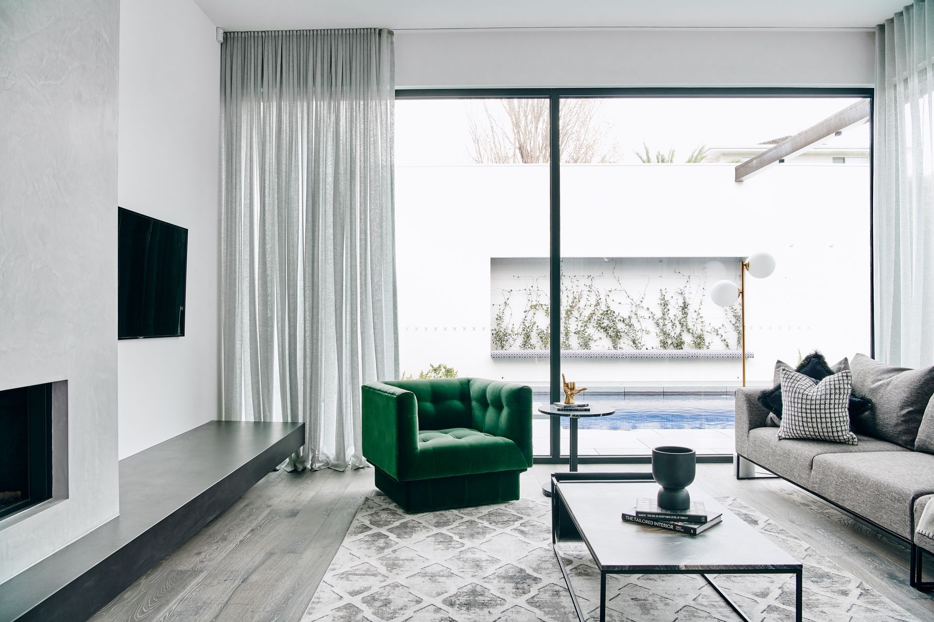 Twostyle transformed this property in Sorrento, VIC, including a T&amp;W rug and lamp.