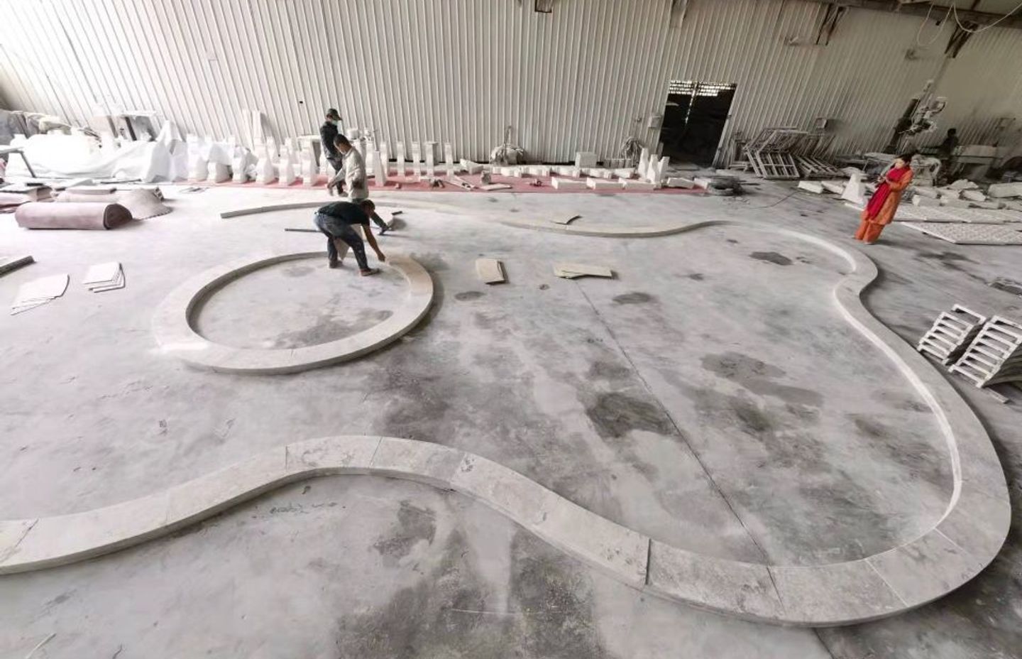 The factory lays out the coping out according to the templates to make sure it all fits seamlessly.