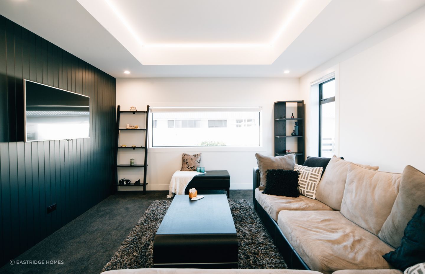 The media room is the perfect space to keep all members of the family entertained