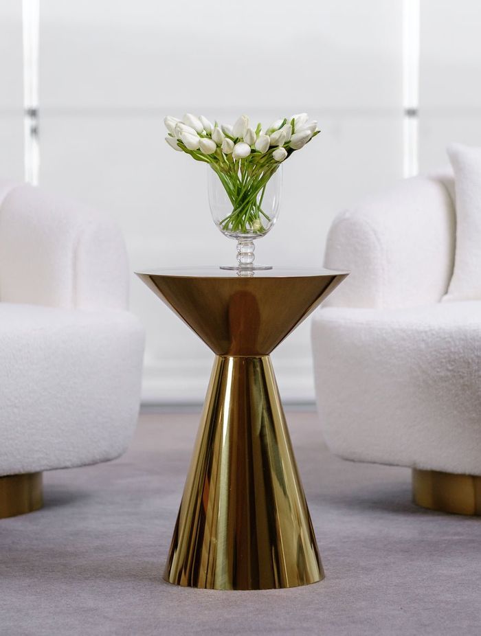Luxurious materials like stainless steel can be crafted into a truly unique bedside table, making a distinct style statement. Featured product: Vogue Side Table.