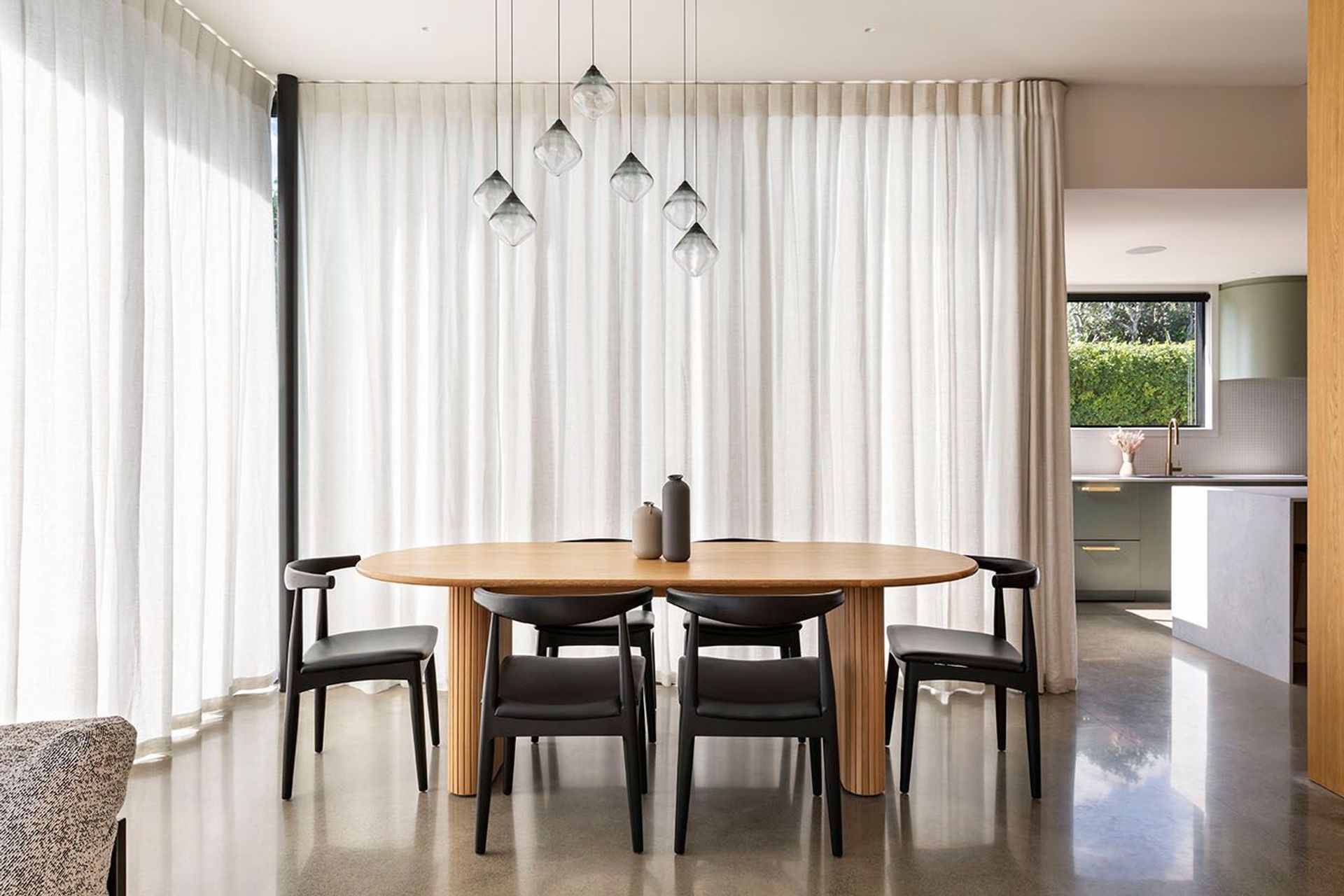 "Lighting is like jewellery for your home," says Mary-Ellen. As example of this is seen in Hello Saturday's Mount Albert project, a contemporary new build with timber and brass accents that add warmth and sophistication.