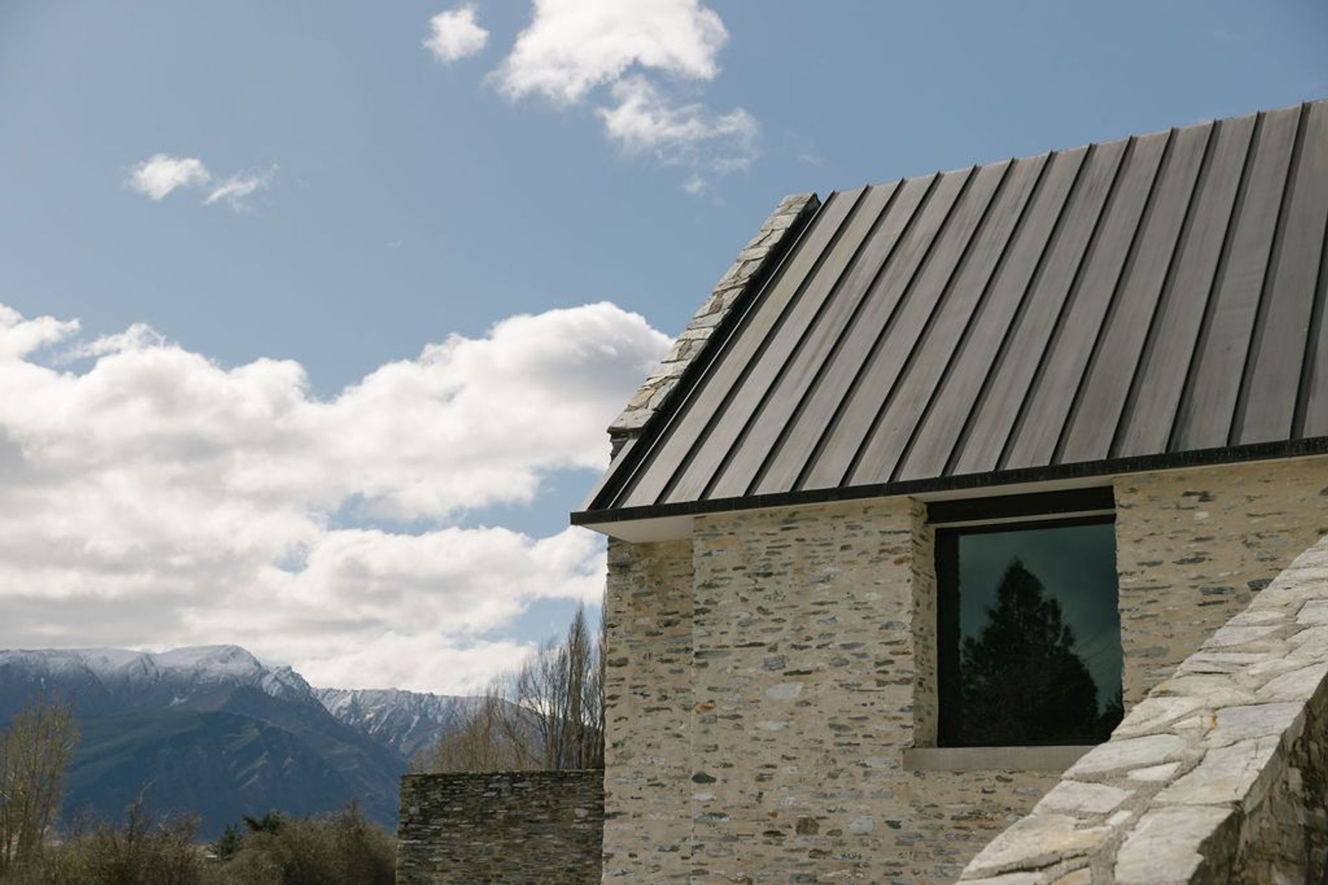 The enviable vista looks out to Coronet Peak.