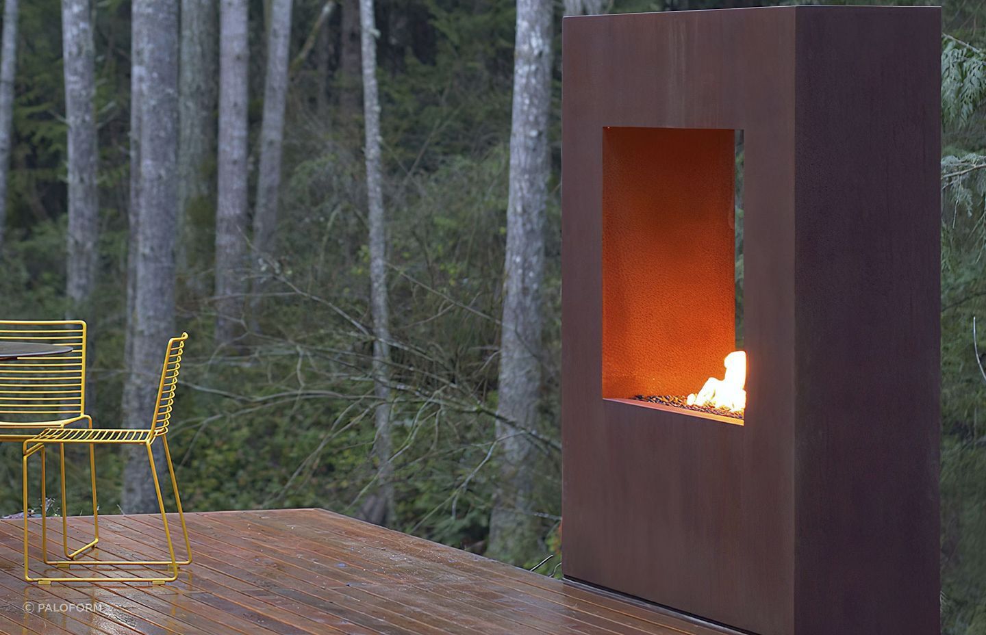  Corten steel gives this fireplace a distressed, naturally aged look