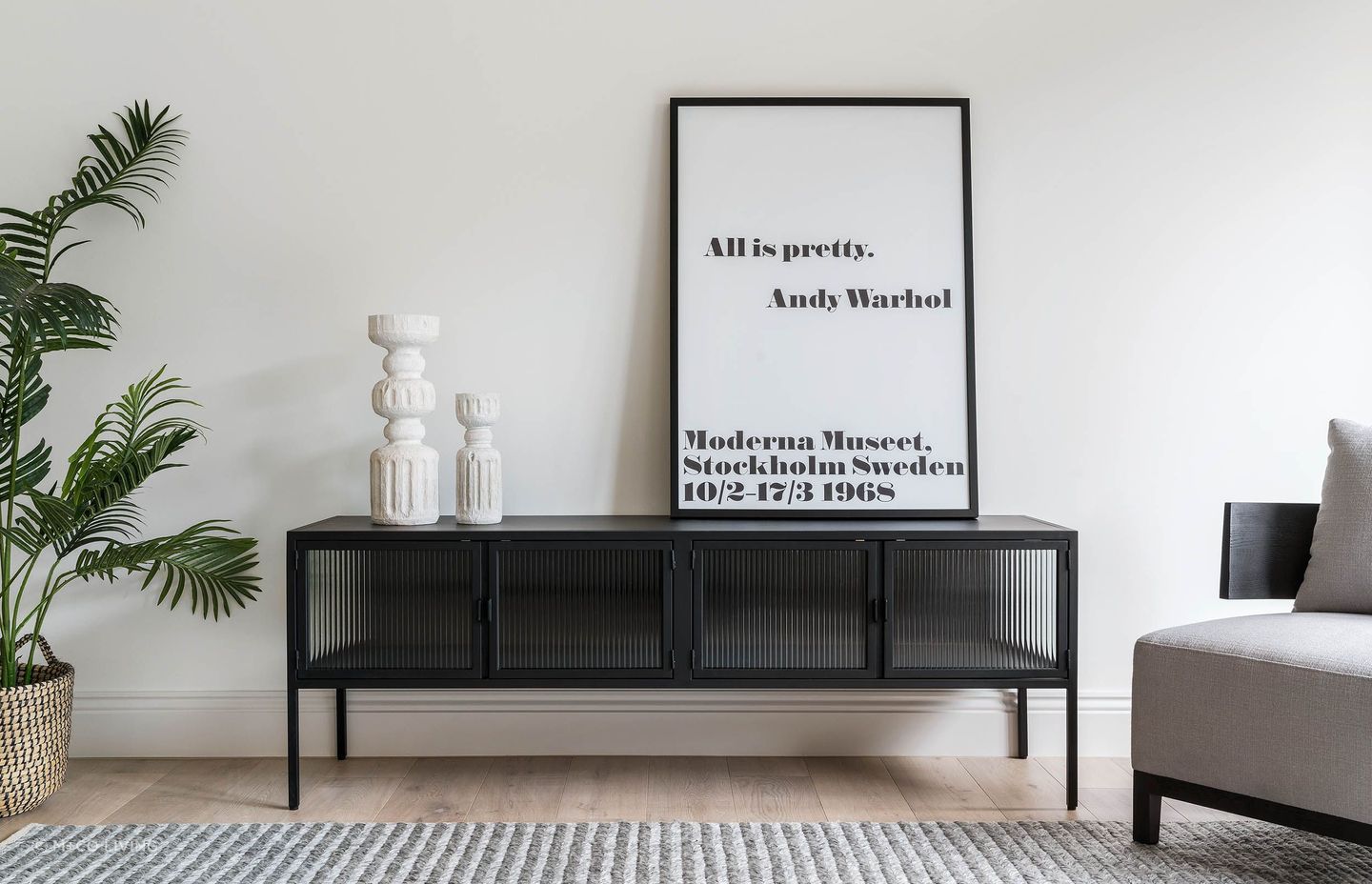 Industrial with a twist of Art Deco - the powder coated metal and glass Ambrose Entertainment Unit