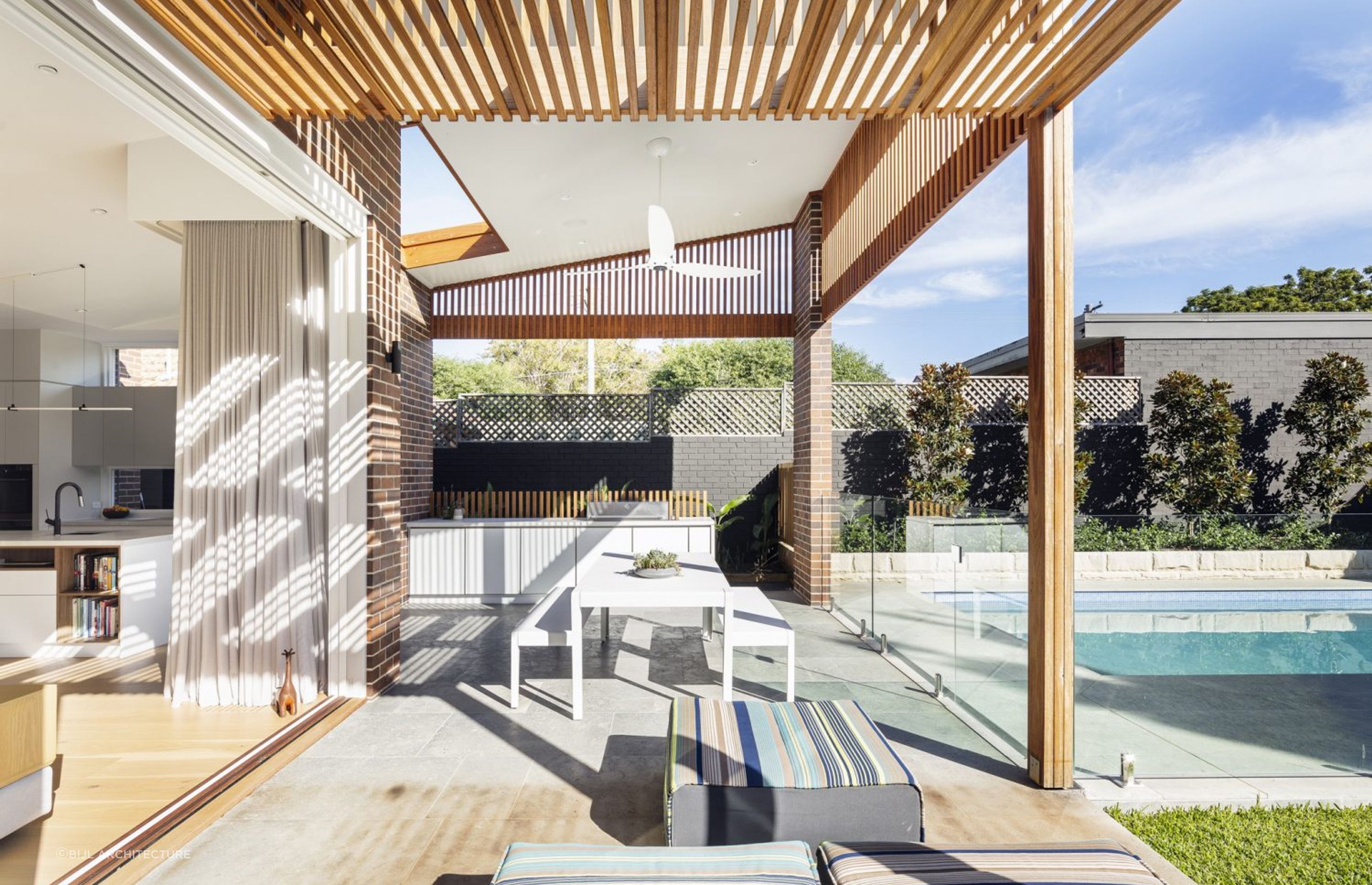 Lacuna House by Bijl Architecture | Photography by Tom Ferguson - an Australian house basking in the sun.
