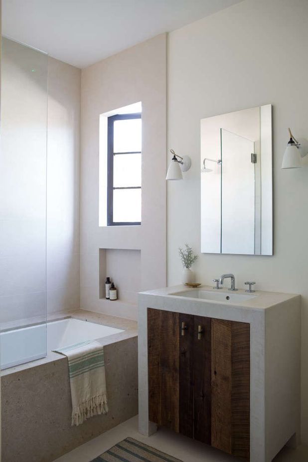 Designer leigh Herzig Tadelakt bathroom.  Tadelakt is a traditional Moroccan wall surfacing technique composed of lime plaster and black soap made from olives. When the ingredients are combined, a chemical reaction between the two creates a waterproof mem