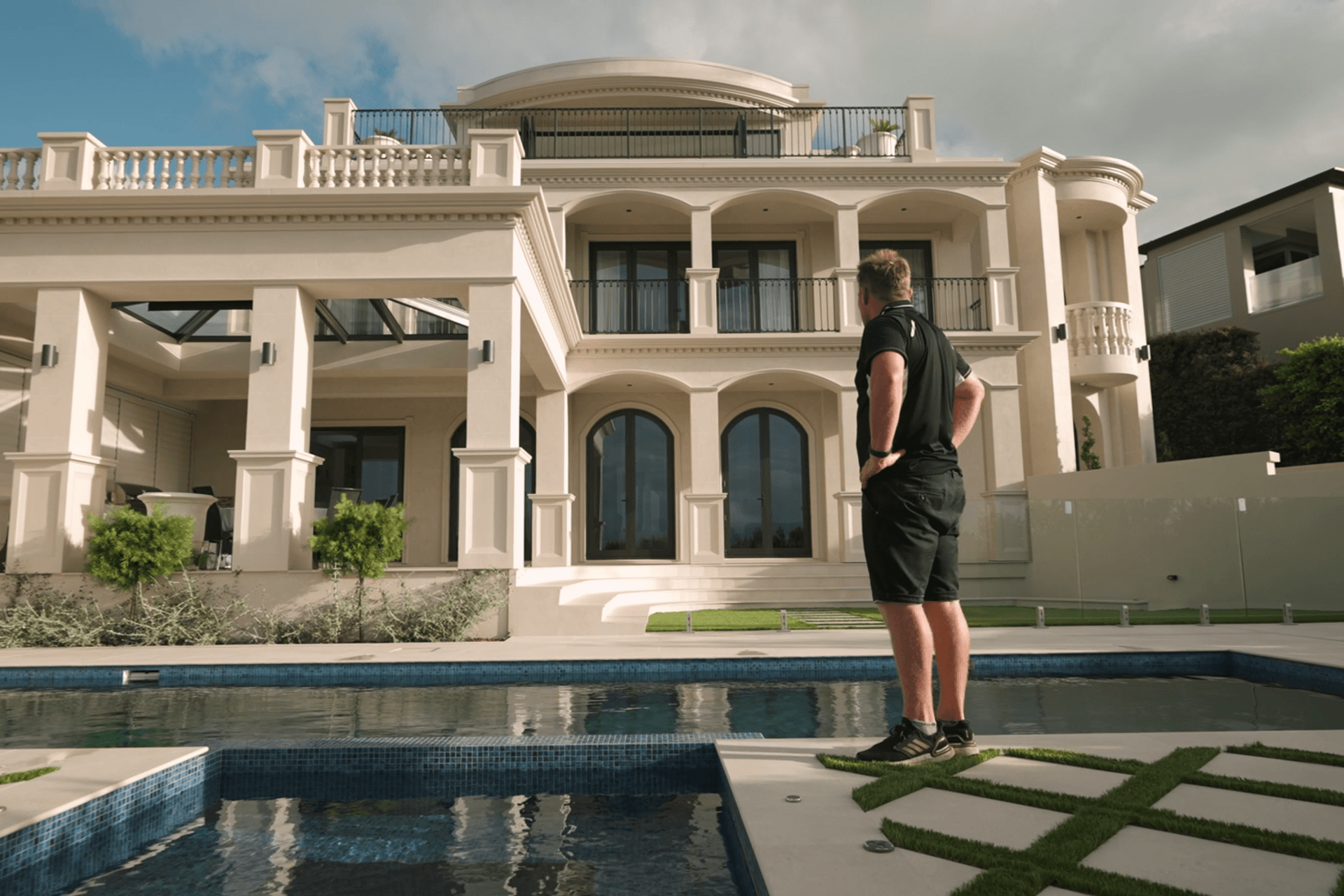 A grand Italianate home built with a glass floor